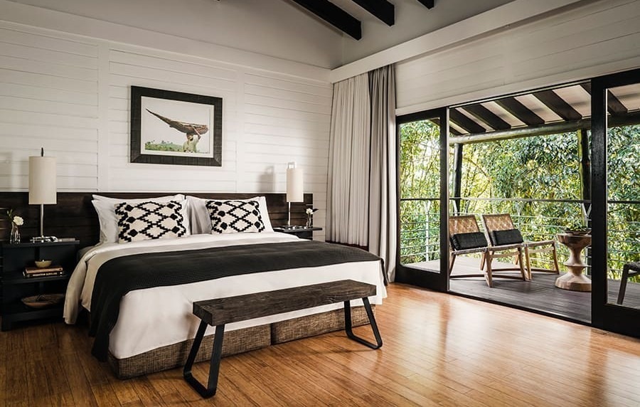 A Bedroom at One & Only Gorilla’s Nest Luxury Lodge – Volcanoes National Park