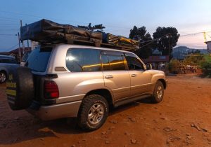 Affordable safari van on game drive in Murchison Falls Uganda